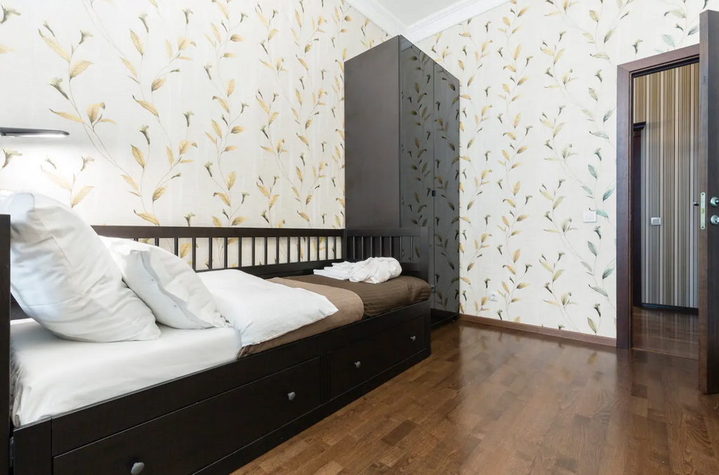 Четырехкомнатная квартира на сутки в Минске спальня